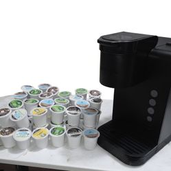Keirug coffee maker with capsules of various flavors. 
