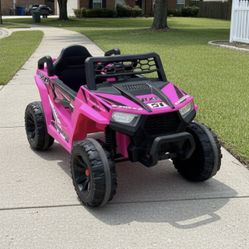 12V Electric Off Road Rose Red Battery Powered Truck! Works great! Includes charger for kids 5 and under. Retails $119.99