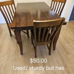 Table and 3 Chairs. Used $75 