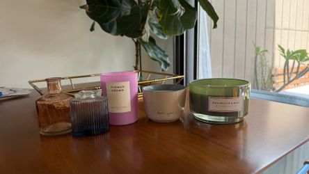 Assorted candles and vases