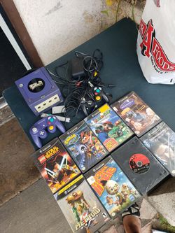Nintendo GameCube with No Games no Extra control No Mic is $120!  Extra control $25!  Games $20! Each x 8 Is $160! $260! All firm or trade are welcome