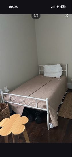 Metal twin bed from Amazon with memory foam mattress