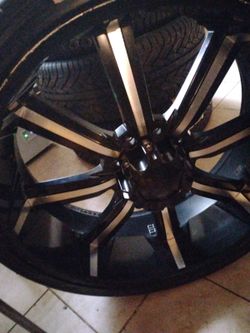 Gently used rims new tires with the stickers on them