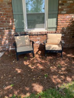 Set of outdoor wicker chairs with cushions