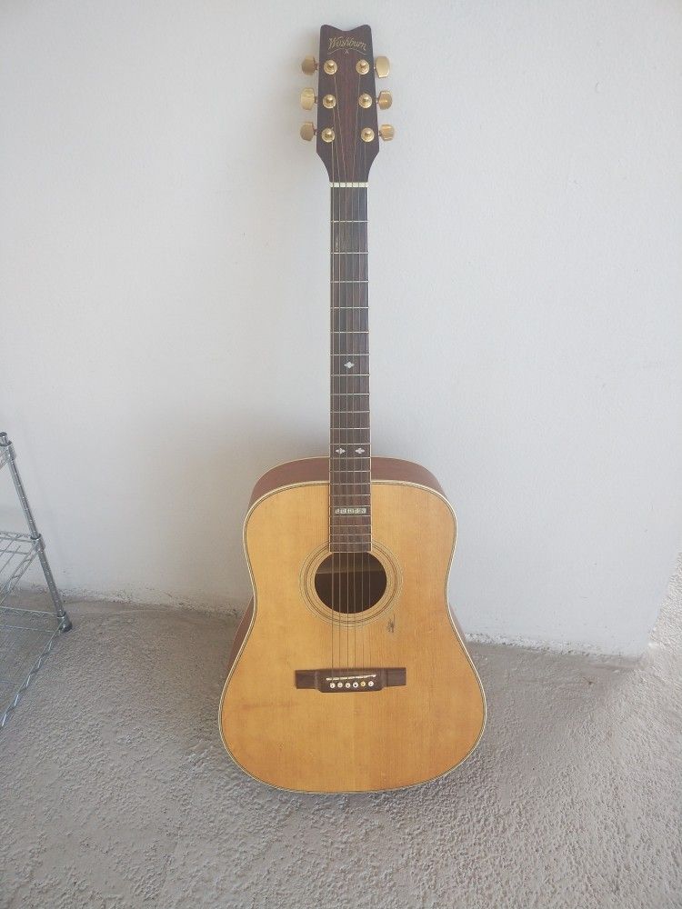 Vintage Handmade Ltd Ed. Washburn Acoustic Guitar
Great sound and action.