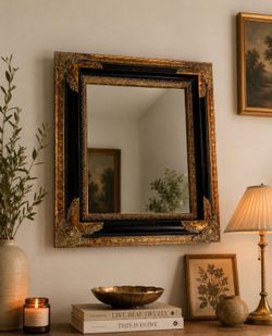 Black and Gold ornate framed mirror