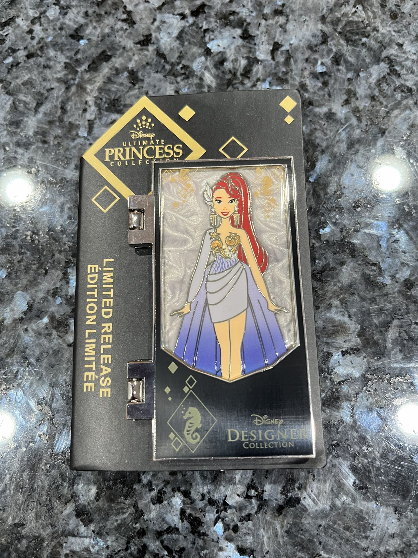 Disney Ultimate Princess Designer Collection Ariel Limited Release Pin.  Size approximately 3 inches long and 1 3/4 wide.  Brand new on original card.