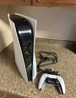 PS5 Disc Edition with power cord and one controller