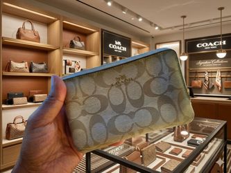Coach Signature Canvas Zip-Around Wallet