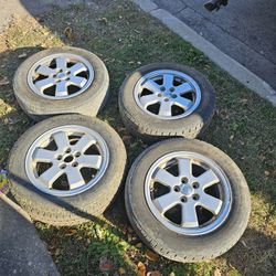set of 4 Firestone Weather Grip winter 185 65 R15 tires on OEM 5x100mm Prius rims 