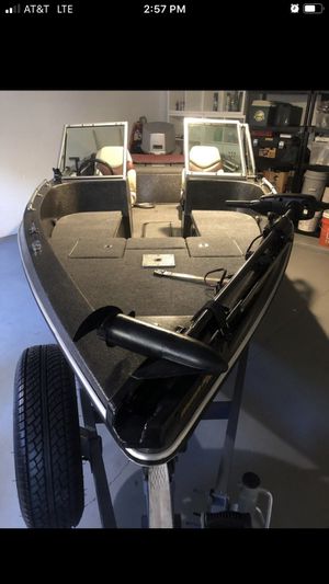 Photo 17 ft bass boat with a 110 Johnson motor , runs great light weight trailer with new tires & spare .Water ready title for boat & trailer in hand tags