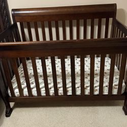 DaVinci Kalani 4-in-1 Convertible Crib with crib size mattress and bedding set
