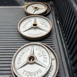 (4) 45 Lbs  (2) 35 Lbs Weights 