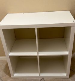White 4-Cube Organizer  White 4-cube storage shelf. Good condition. Great for books, baskets, toys, crafts, or office storage.  $30 OBO
