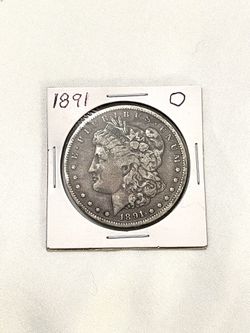 Very fine condition sealed in case 1891-O Morgan  silver dollar with some toning
