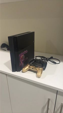 Sony PlayStation 4 Console with Two Controllers