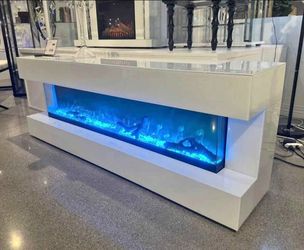Fireplace with speakers and led crystal lights glass top and sides eclectic modern