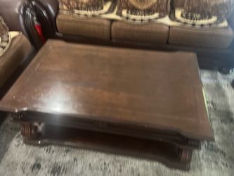 Dark Wood coffee table and sofas