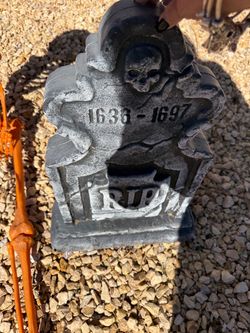 Halloween skeletons and two stones
