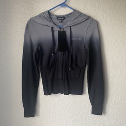 Brand new woman’s Bebe brand black and Gray colored tie dye jacket up for sale 
