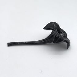 This black art glass lily trumpet vase stands at 8 inches tall and is hand-blown, making it a unique and elegant piece for home decor. The modern desi