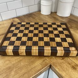 dark walnut and hard maple checkered cutting boards