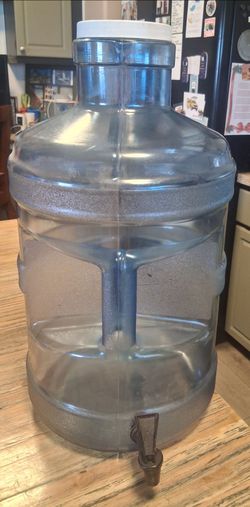 Plastic 5 gal water bottle with screw on cap and valve dispenser