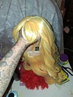 Med length yellow blond hair curly