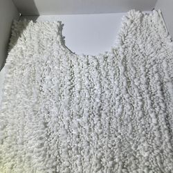 U shaped white shag rug