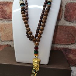 #2251, TABETAN NECKLACE HIMALAYAN BUDDHISM, GOLD PLATED AND WOOD BEADS