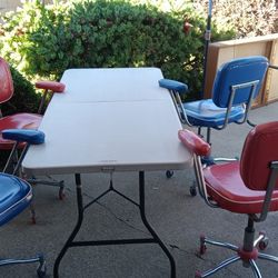 Downsizing, vinyl M C M / Vintage Rolling Chairs