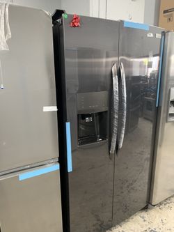 Frigidaire gallery side by side in dark stainless