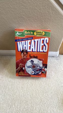 Brand new sealed Tiger Woods Wheaties box. Comes with an EA Sports Computer Game Sampler