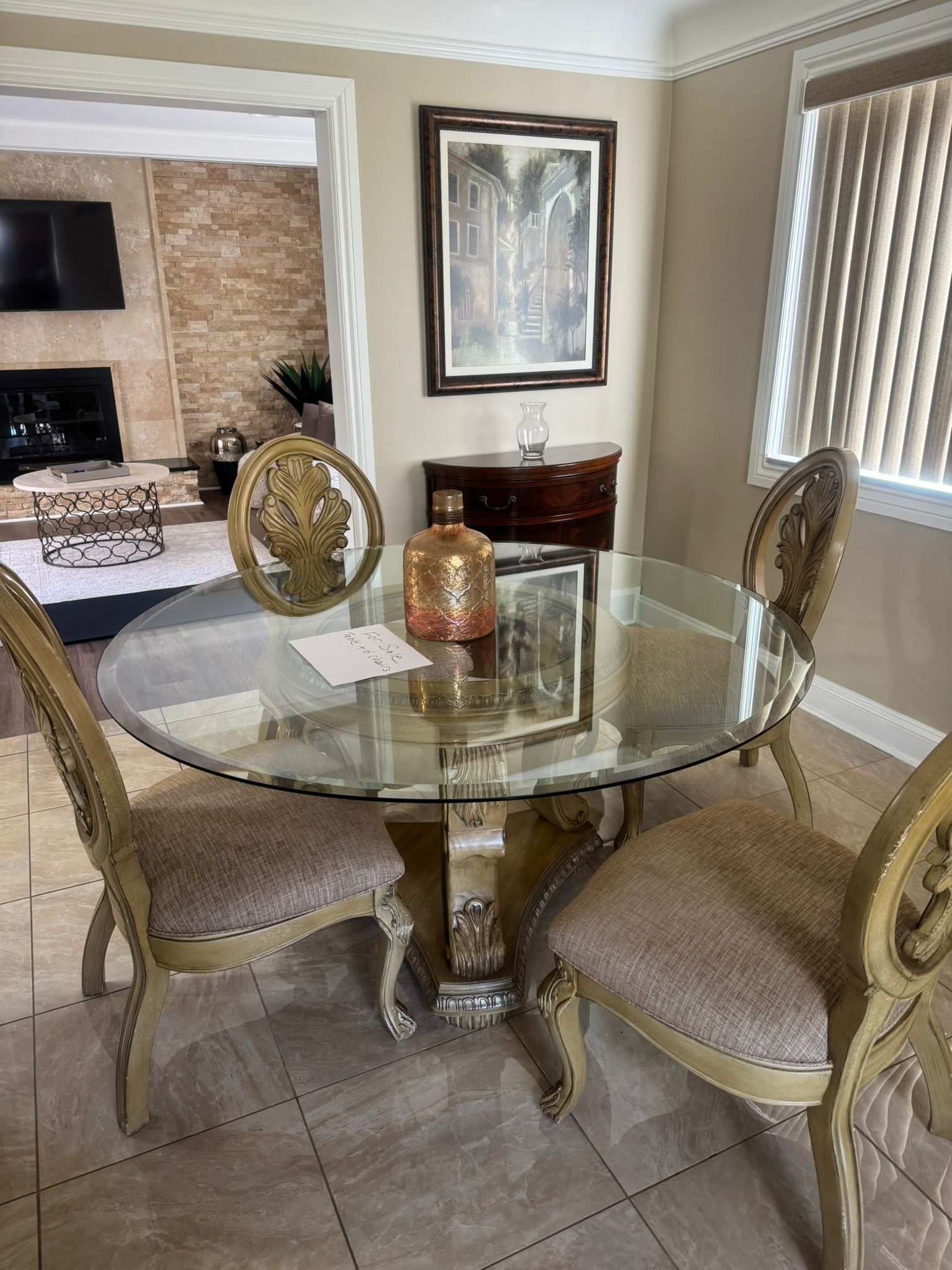Glass dining table and 6 total chairs
