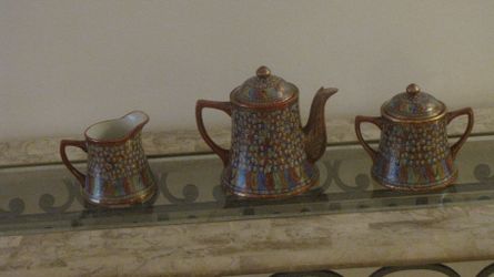 Thousand Faces Tea Set