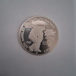 Olympiad One Dollar Silver Coin