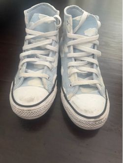 blue converse with clouds
