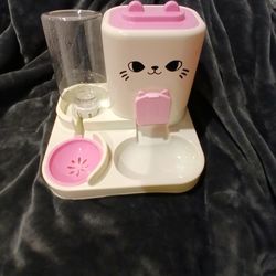 Small Pet Feeder. Works Great. Never Used. Just Assembled And Tested.