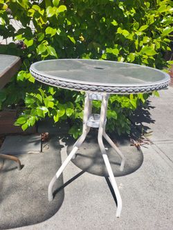 2 outdoor patio tables $40 each