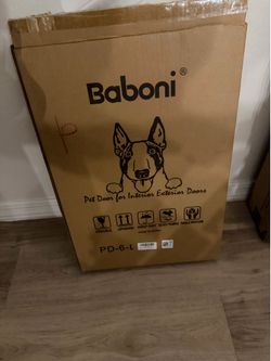 Baboni dog door for door. Need gone Asap. Brand New