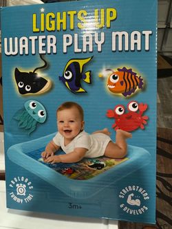 Lights Up Water Play Mat. New See pictures. Great Gift