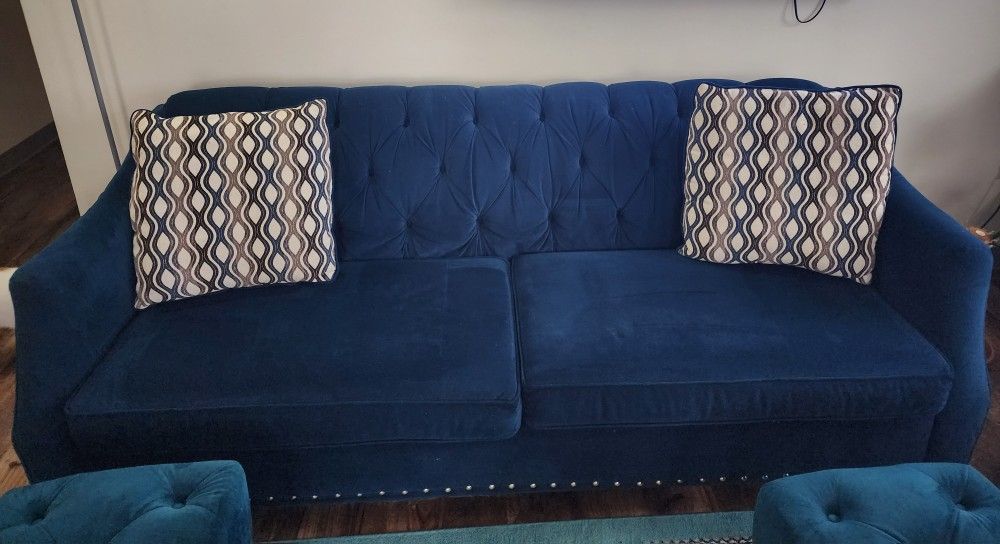 Royal blue suede sofa and loveseat