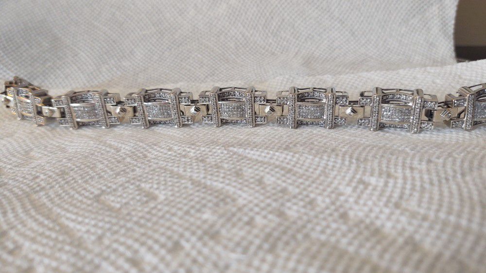 14 Kt. White Gold Diamond Bracelet appox. 60.2 Grams Weight.   With 581 Diamonds Total. 350 Princess Cut Diamonds and  251 Round Dia.s Total of 11 Ct 