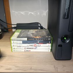 Xbox 360 Slim Console Only Bundled With Games ( No Cables & Controllers)