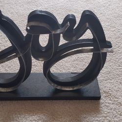 Wood and metal Joy sign