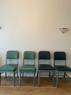 Vintage metal leather green chairs