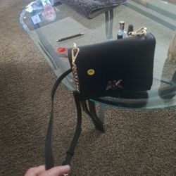 New  AK BRAND PURSE  OVER THE SHOULDER STRAP . YOU CAN ADJUST STRAP. GOOD CHRISTMAS GIFT FOR DOLLARS 