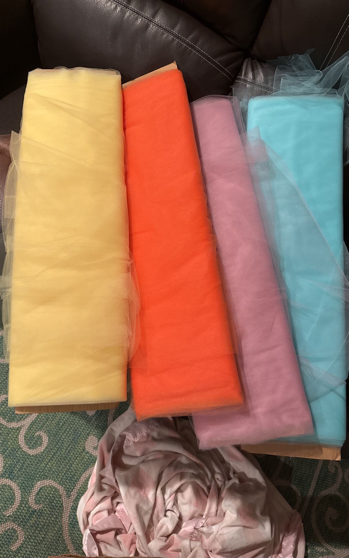 Tulle fabric bolts orange yellow teal blue and purple