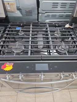 Whrilpool Gas Range with Touch Controls and knobs