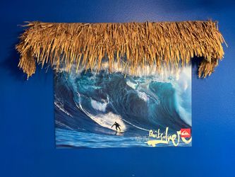 Surf poster and bamboo palapa